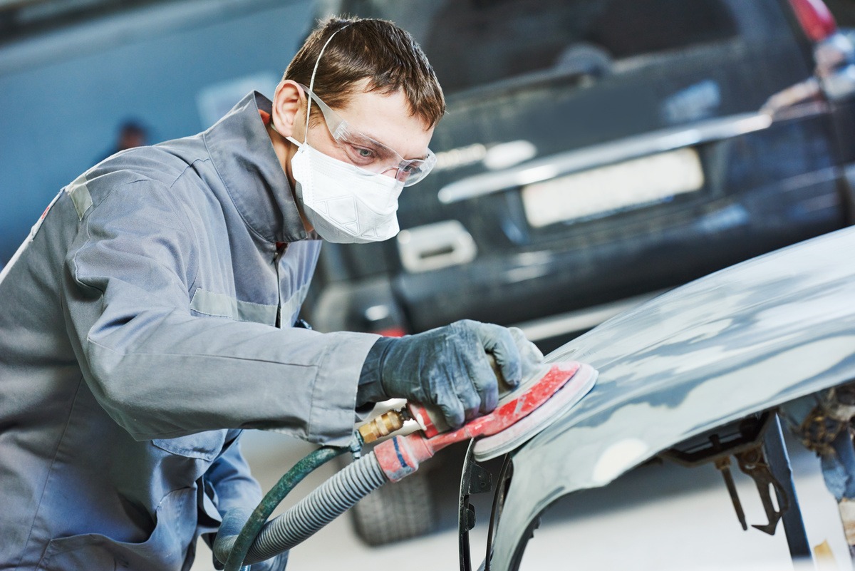 employee working on collision repair